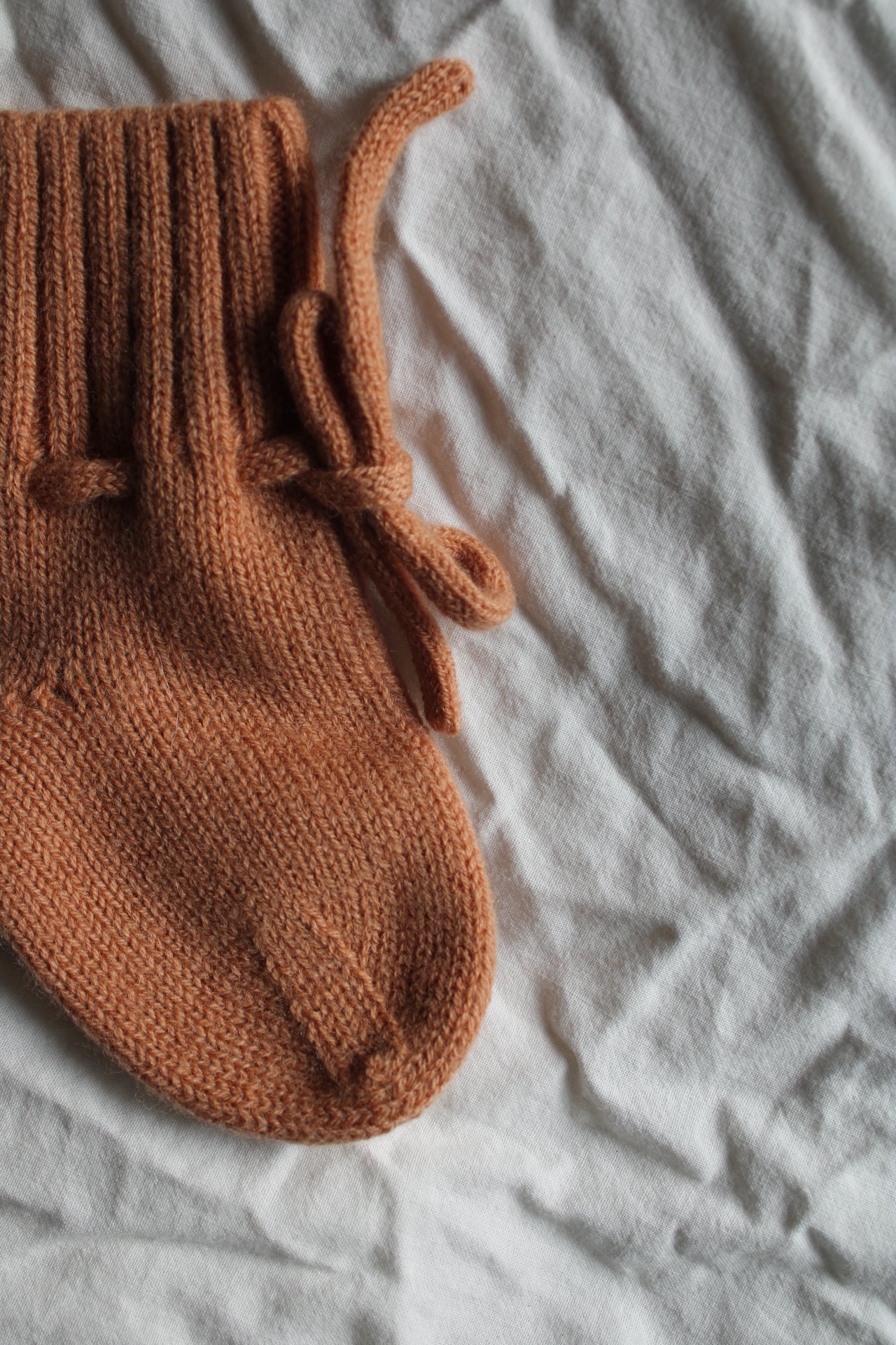 Natürliche Babyschuhe aus 100% Merinowolle - pfirsisch