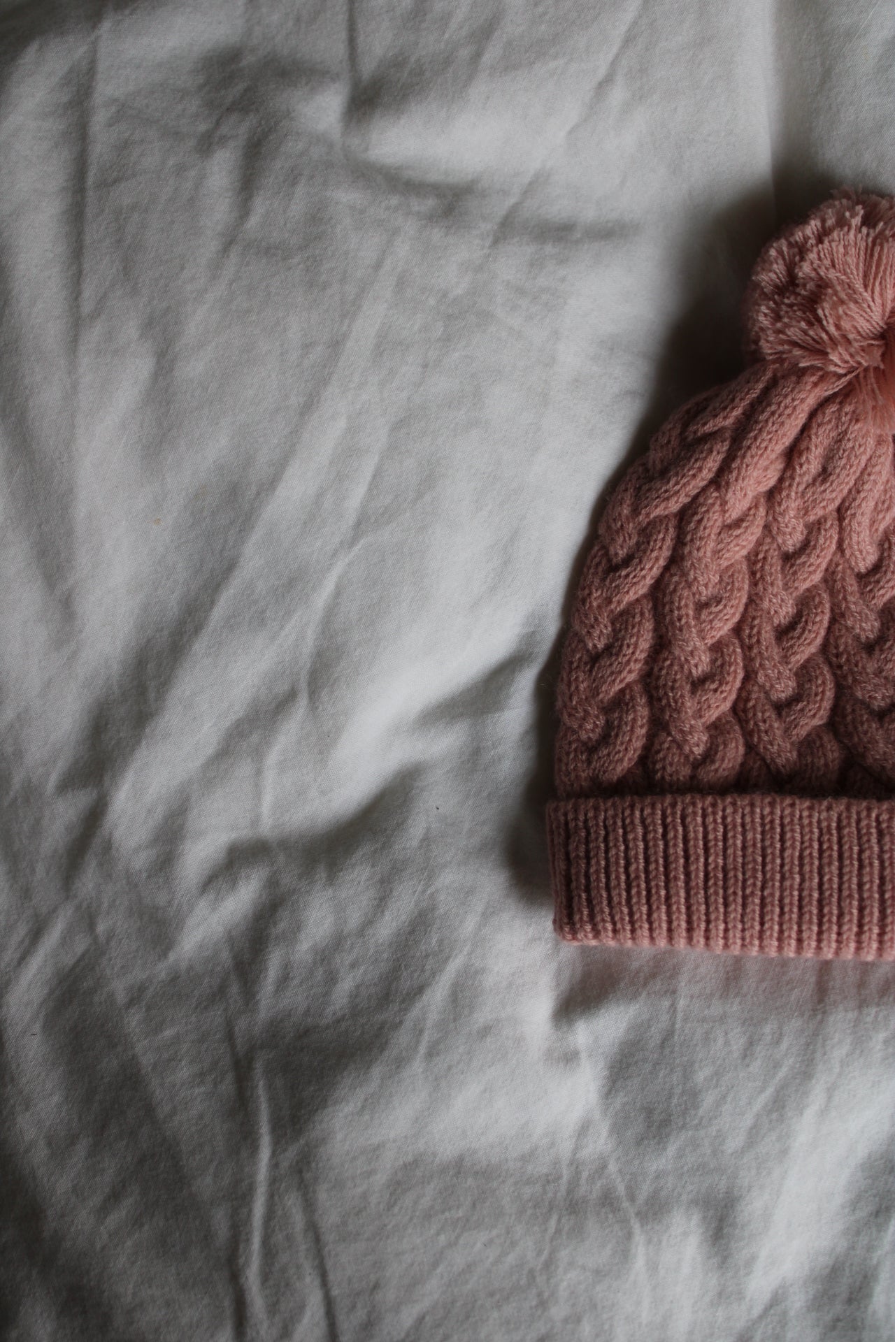 Newborn-Beanie aus Merinowolle - rosé